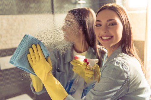 Local cleaner working in a Balham flat with careful attention to detail